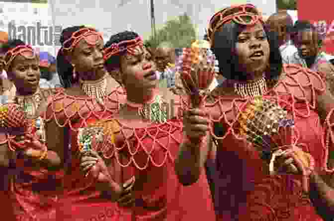 A Group Of People Dancing In Traditional Attire, Surrounded By Colorful Decorations. Best Of Cozumel: A Traveler S Guide To The Island S Best