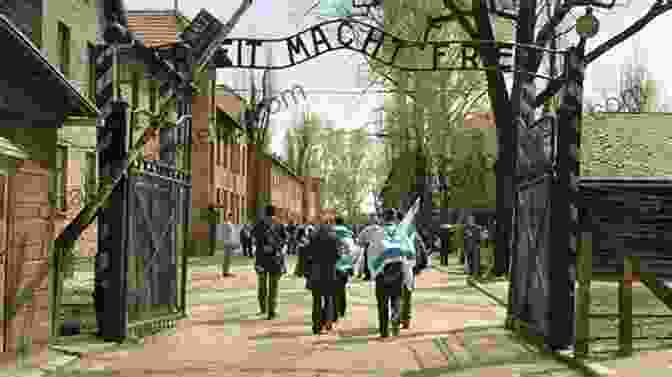 A Group Of People Walking Through The Auschwitz Birkenau Concentration Camp Memorial Site In Poland. Controversial Monuments And Memorials: A Guide For Community Leaders (American Association For State And Local History)