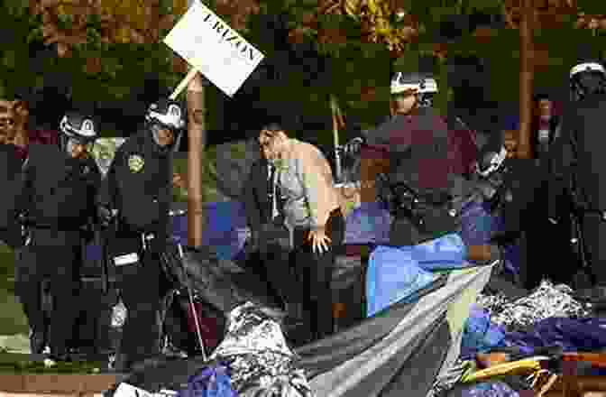 A Large Group Of People Protesting In Zuccotti Park Occupy Nation: The Roots The Spirit And The Promise Of Occupy Wall Street