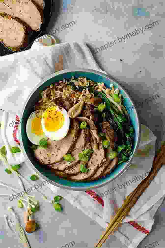 A Steaming Bowl Of Ramen, Adorned With Sliced Pork, Vegetables, And A Soft Boiled Egg The Ultimate Japanese Noodles Cookbook: Amazing Soba Ramen Udon Hot Pot And Japanese Pasta Recipes