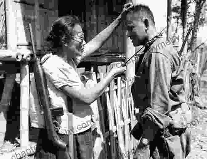 A Young American Soldier And A Japanese Woman Standing In Front Of A Japanese House. Tsuchino My Japanese War Bride