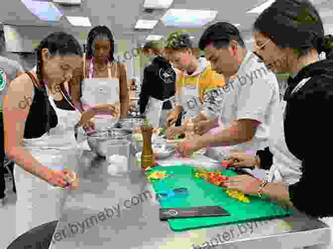 Students Engrossed In A Hands On Cooking Class, Learning Culinary Techniques. Food Studies: A Hands On Guide