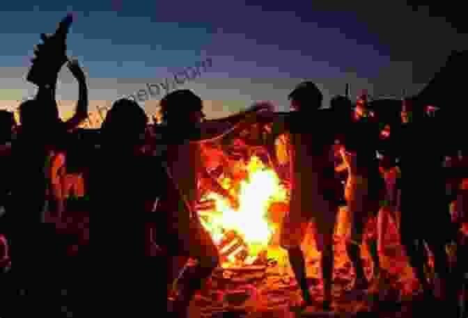 Surfers Enjoying A Beach Bonfire The History Of Surfing Matt Warshaw